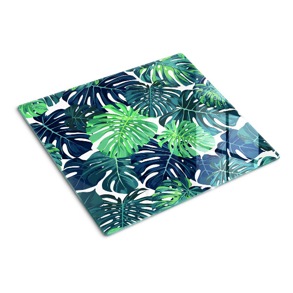 Planche à découper en verre Feuilles de Monstera sur fond tropical