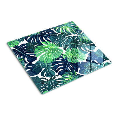 Planche à découper en verre Feuilles de Monstera sur fond tropical
