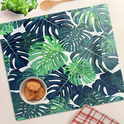 Planche à découper en verre Feuilles de Monstera sur fond tropical