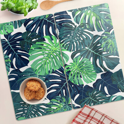 Planche à découper en verre Feuilles de Monstera sur fond tropical