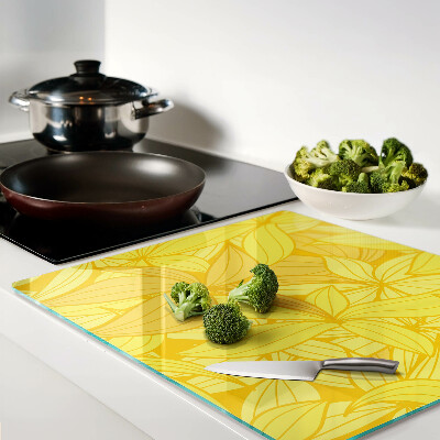 Planche à découper verre Feuilles jaunes de style tropical