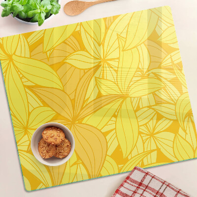 Planche à découper verre Feuilles jaunes de style tropical