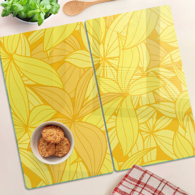 Planche à découper verre Feuilles jaunes de style tropical