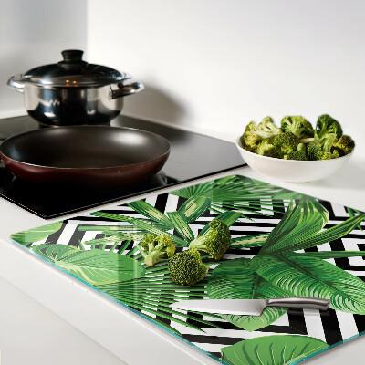 Planche à découper en verre Feuilles tropicales sur rayures