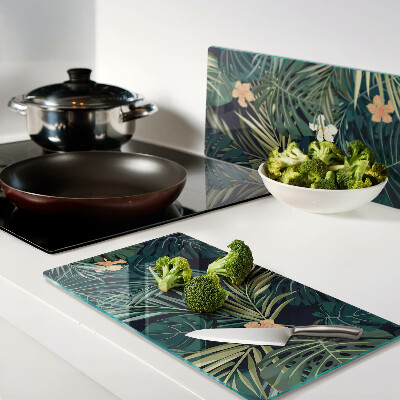 Planche à découper en verre Motif tropical avec des feuilles et des fleurs