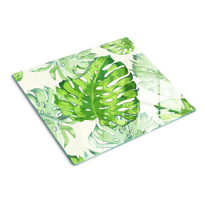 Planche à découper en verre Feuilles de Monstera sur fond clair