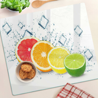 Planche à découper en verre Agrumes en tranches colorées