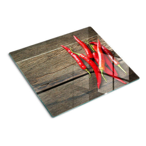 Planche à découper verre Piments sur fond de bois