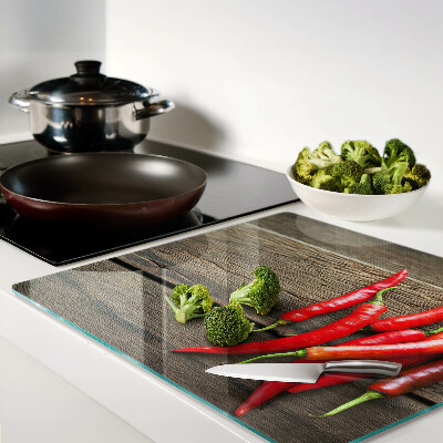 Planche à découper verre Piments sur fond de bois