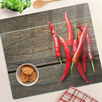 Planche à découper verre Piments sur fond de bois