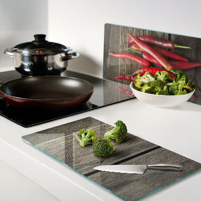 Planche à découper verre Piments sur fond de bois