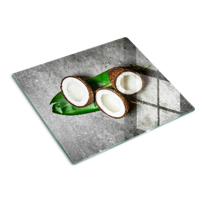 Planche à découper en verre Noix de coco sur fond de béton