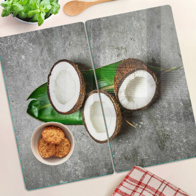 Planche à découper en verre Noix de coco sur fond de béton