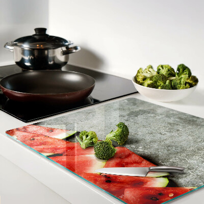 Planche à découper en verre Tranches de pastèque sur fond gris