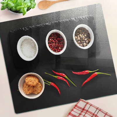 Planche à découper verre Épices et poivrons rouges