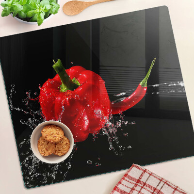 Planche à découper en verre Poivron rouge dans l'eau