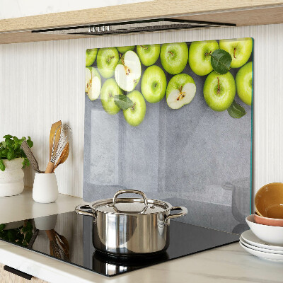Planche à découper verre Pommes vertes sur une surface grise