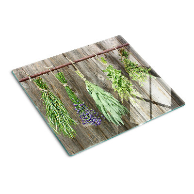 Planche à découper en verre Herbes sur fond de bois