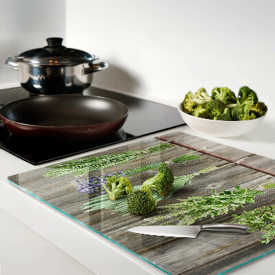 Planche à découper en verre Herbes sur fond de bois