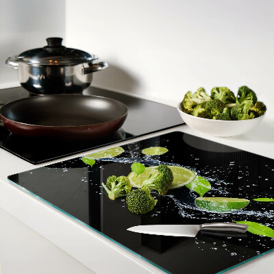 Planche à découper verre Citrons dans l'eau avec des feuilles de menthe