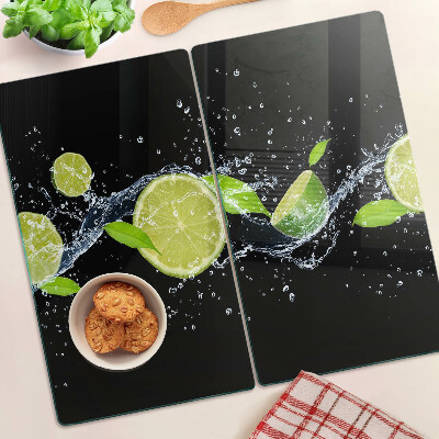 Planche à découper verre Citrons dans l'eau avec des feuilles de menthe