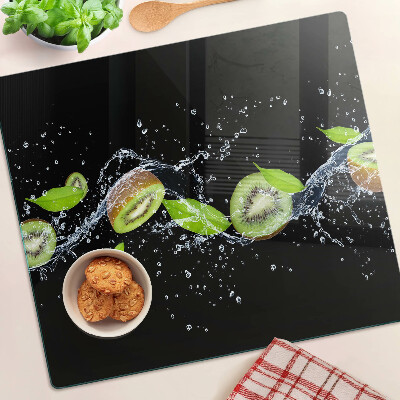 Planche à découper verre Kiwi dans l'eau avec des feuilles