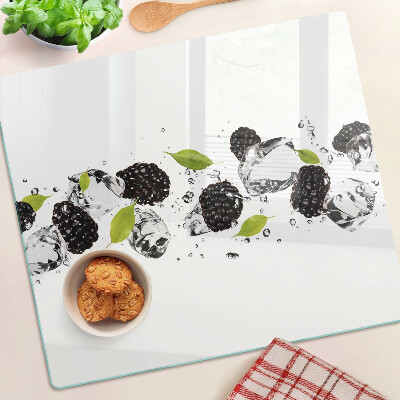 Planche à découper en verre Framboises avec feuilles et gouttes d'eau