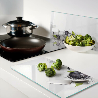 Planche à découper en verre Prunes dans l'eau avec des feuilles