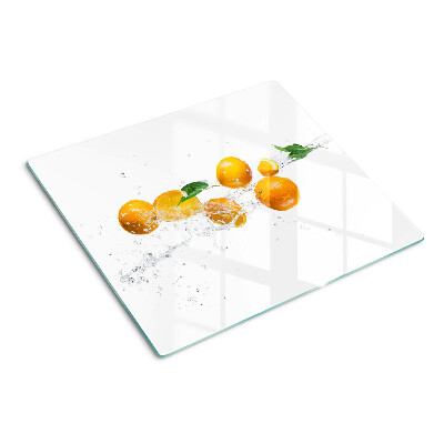 Planche à découper verre Agrumes avec de l'eau