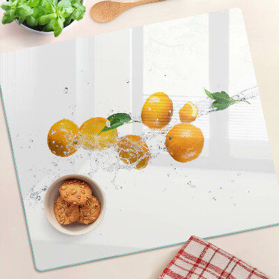 Planche à découper verre Agrumes avec de l'eau