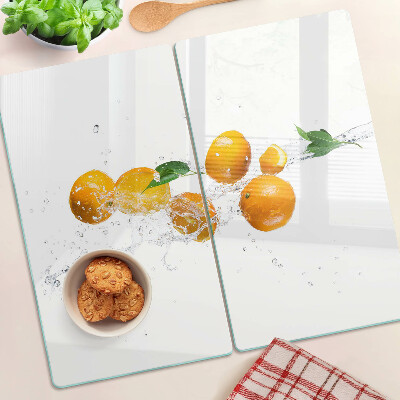 Planche à découper verre Agrumes avec de l'eau