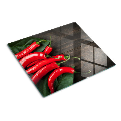 Planche à découper en verre Piments sur fond de bois
