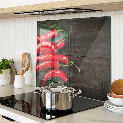 Planche à découper en verre Piments sur fond de bois