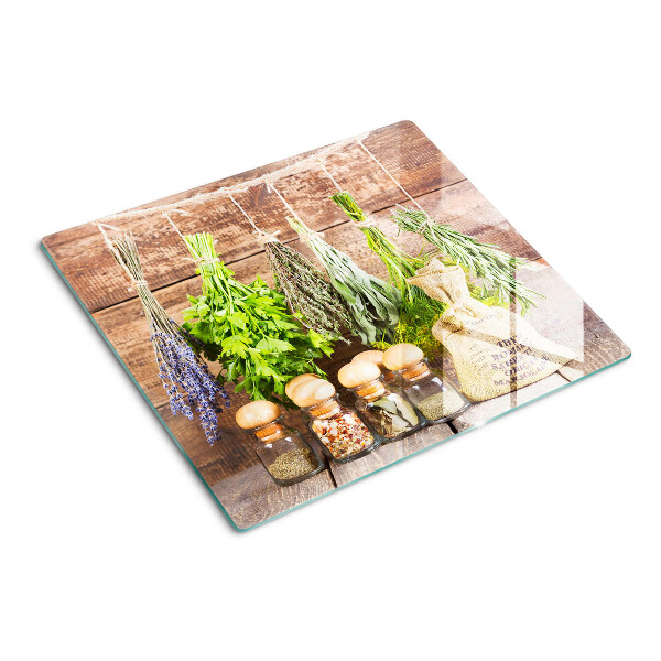Planche à découper verre Herbes et épices sur fond de bois