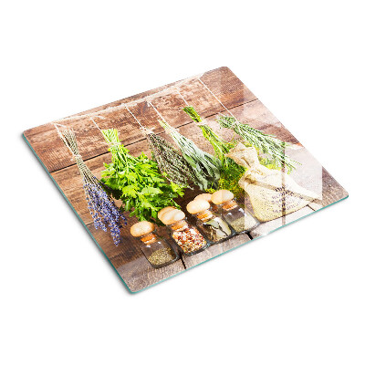 Planche à découper verre Herbes et épices sur fond de bois