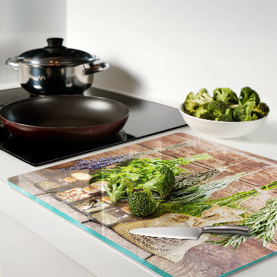 Planche à découper verre Herbes et épices sur fond de bois