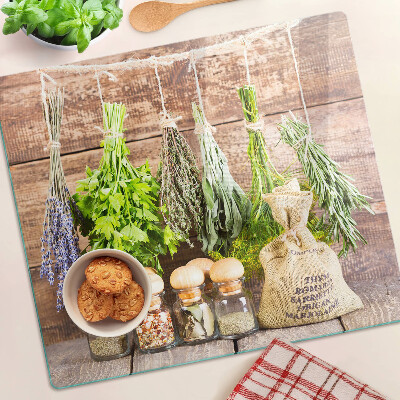 Planche à découper verre Herbes et épices sur fond de bois