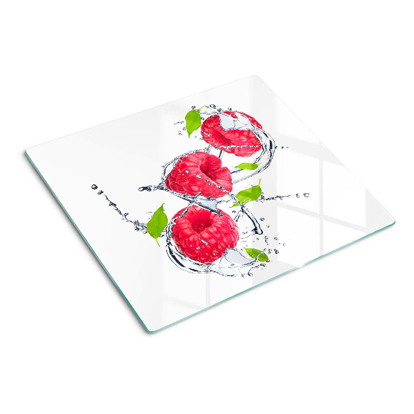 Planche à découper verre Framboises dans l'eau avec des feuilles