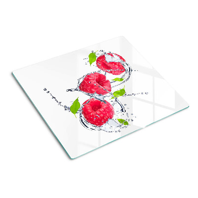 Planche à découper verre Framboises dans l'eau avec des feuilles