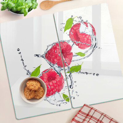 Planche à découper verre Framboises dans l'eau avec des feuilles