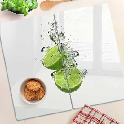 Planche à découper en verre Citrons dans de l'eau pétillante