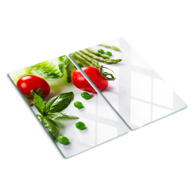 Planche à découper verre Légumes sur un comptoir blanc