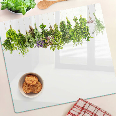 Planche à découper en verre Herbes en pots suspendus