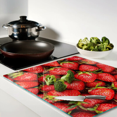 Planche à découper verre Fraises sur fond rouge