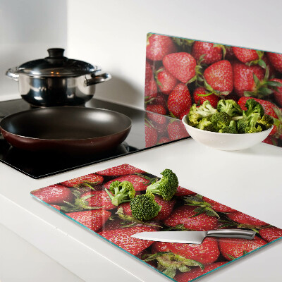 Planche à découper verre Fraises sur fond rouge