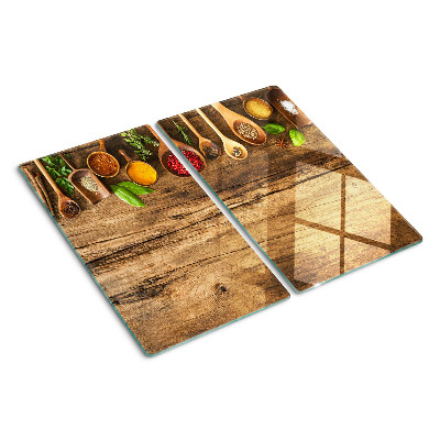 Planche à découper en verre Épices et herbes sur fond de bois