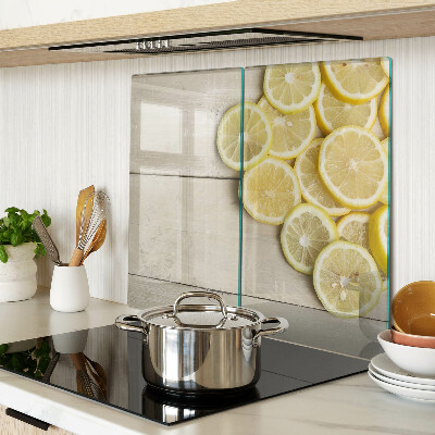 Planche à découper verre Tranches de citron sur fond de bois