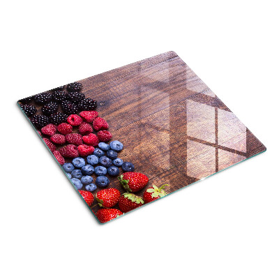 Planche à découper verre Fruits des bois sur fond de bois
