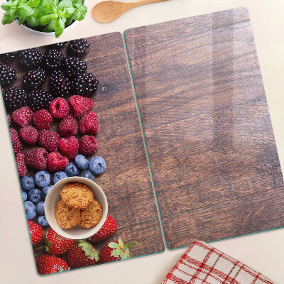 Planche à découper verre Fruits des bois sur fond de bois