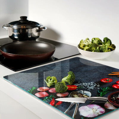 Planche à découper en verre Légumes et épices sur fond sombre